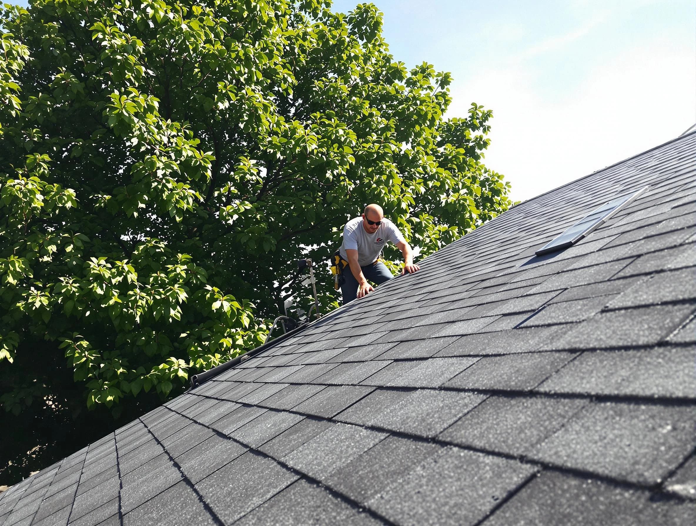 Certified roofers from Euclid Roofing Company working in Euclid, OH